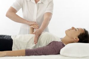 A Patient receiving Kinesiology treatment