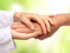 Doctor's hand holding a patient's hand. We provide food allergy treatment