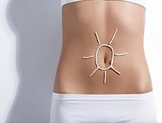 Woman's abdomen looking perfect after having received the neural scar therapy at lifeworks