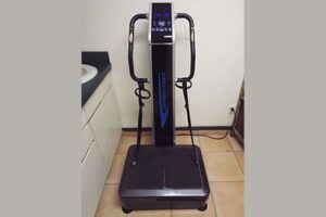 The Vibra-Plate machine is a plate with bars that one holds onto and it actually vibrates.