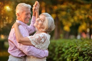 Two seniors dancing. Prolozone therapy success story