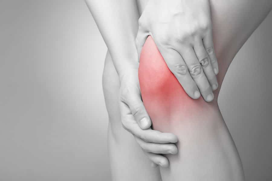 Closeup image of someone's injured knee. We offer joint pain therapies