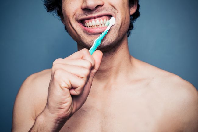 Man brushing his Healthy Teeth