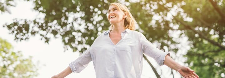 Middle aged woman feeling well after receiving bioidentical hormone treatment
