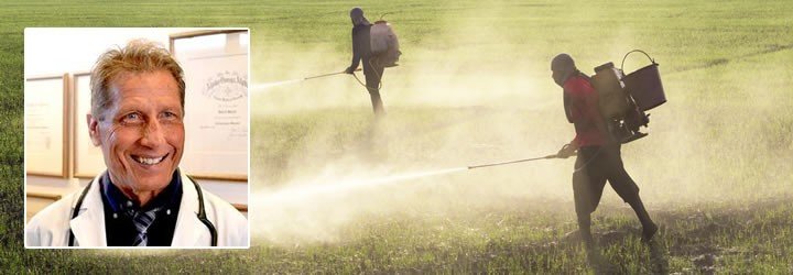An agriculture worker using dangerous pesticides on a field.