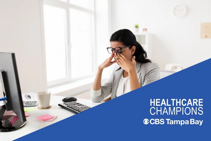 A tired woman in front of the PC. Dr Minkoff talks about chronic fatigue on healthcare champions
