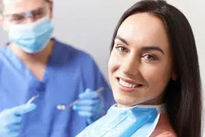 Woman at dentist smiling