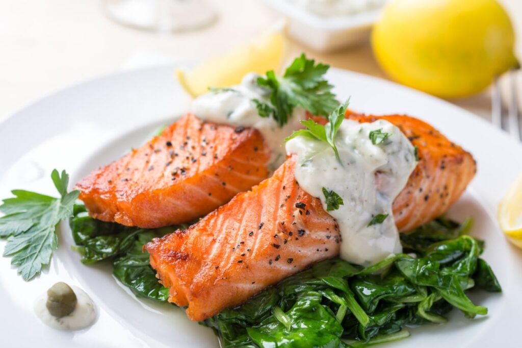 Iron rich foods include salmon and spinach